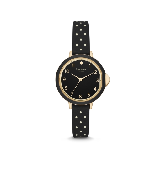 Montre kate spade new york doré rose dotée d’entre-cornes en forme de pique.